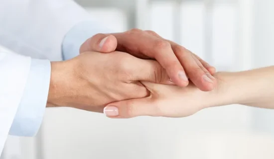 depositphotos_77719168-stock-photo-friendly-male-doctor-hands-holding